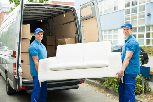 Office relocation planning in Hammersmith with moving boxes and workspace setup