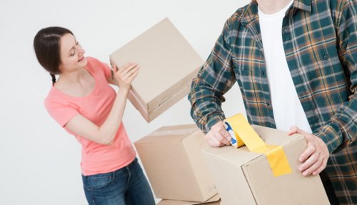House removals team planning a move in a Hammersmith street