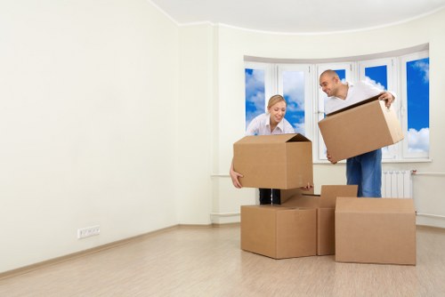 Packed boxes and furniture ready for a flat move in Hammersmith