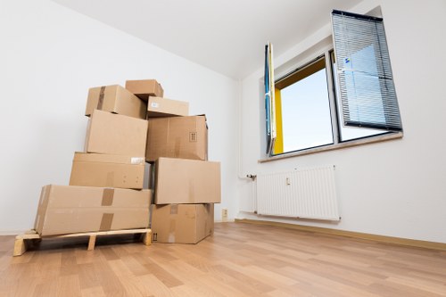 Loading furniture into a moving van in West London