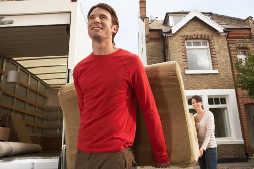 Careful loading of household furniture for removals in West London
