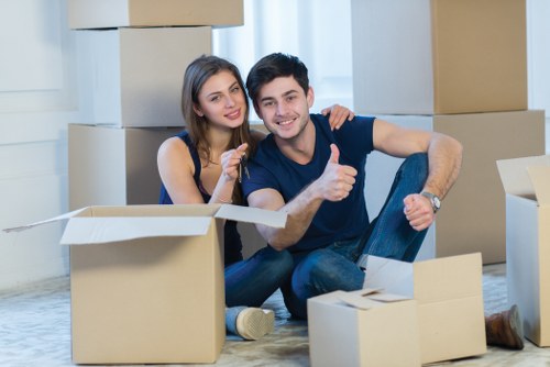 House movers planning a residential move in Hammersmith with boxes and furniture