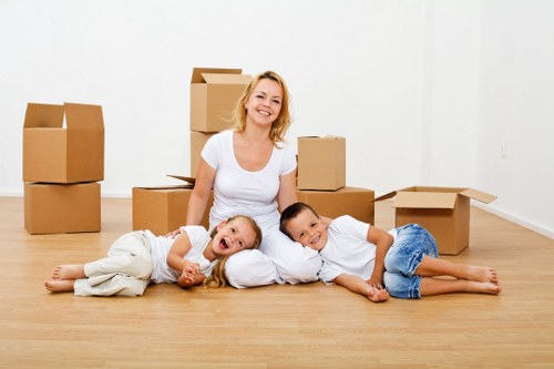 Professional removals team loading household items for a Hammersmith move