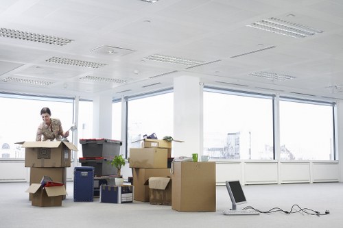 Newly relocated Hammersmith office with desks and boxes ready for setup