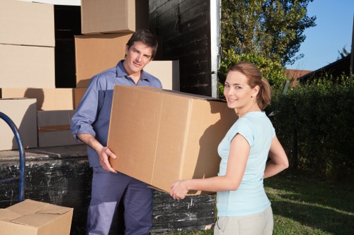 Worker assessing moving risks before transport