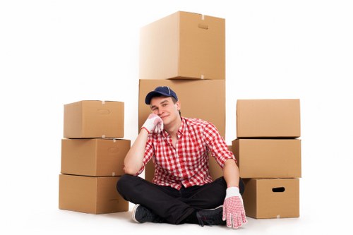 A professional team moving office furniture and equipment in Hammersmith