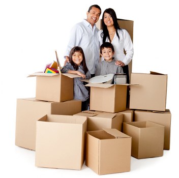 Professional movers unloading furniture at a West London property